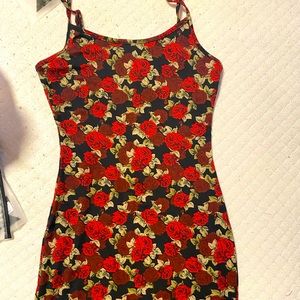 Spaghetti strap mini dress with roses around.